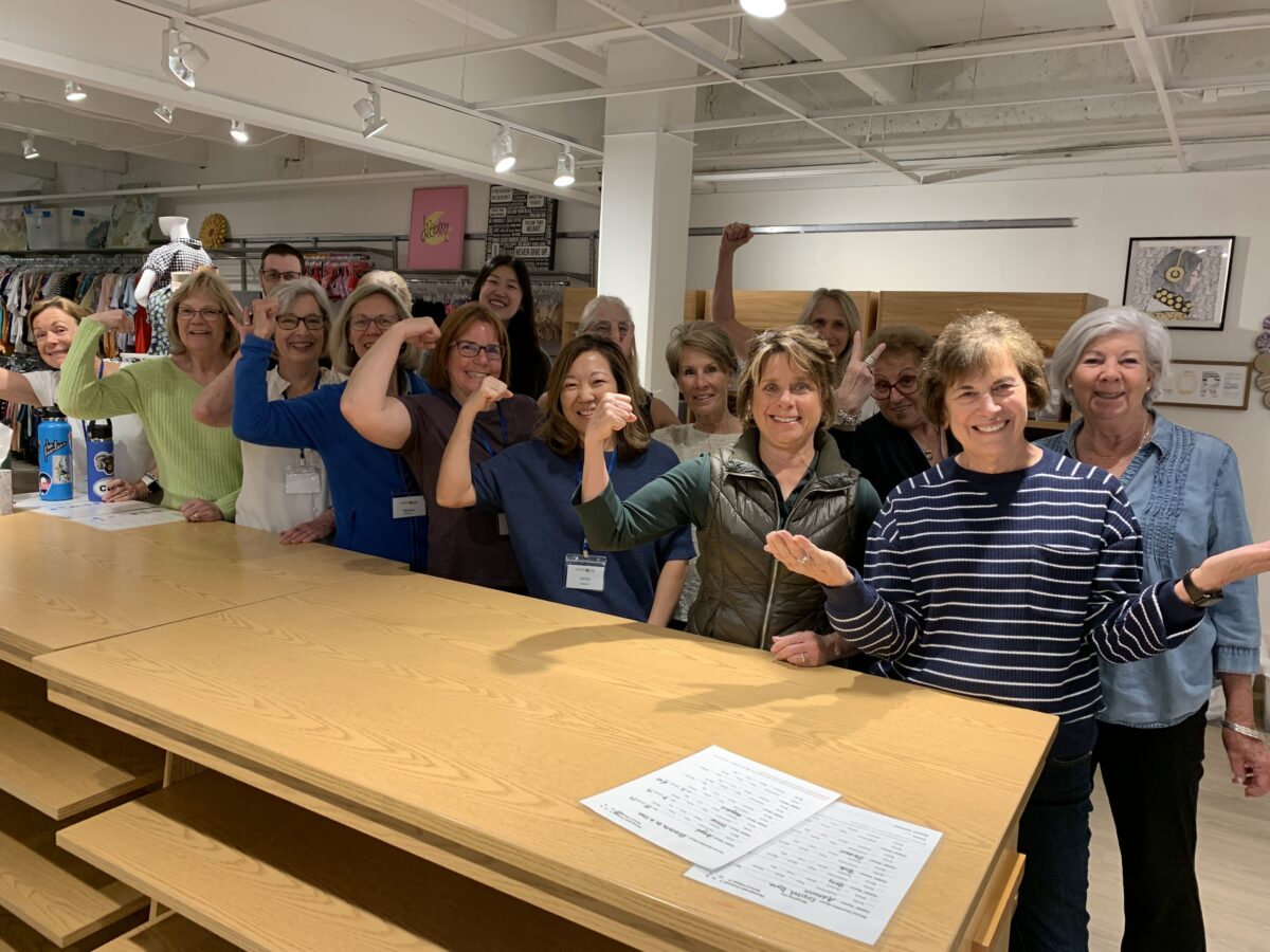  A group of volunteers behind a desk